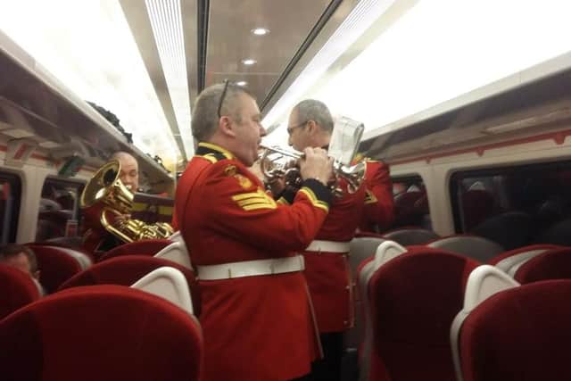 The band performs in one of the carriages.