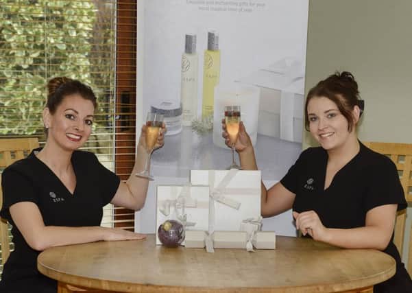 Sarah Hindhaugh and Kayla Rickaby celebrate the 18th anniversary of The Secret Spa.
 Picture by Jane Coltman