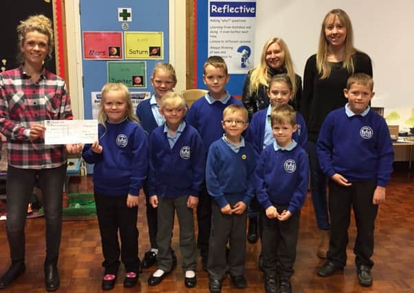 Amble Links First School has donated Â£300 to EdUKaid.