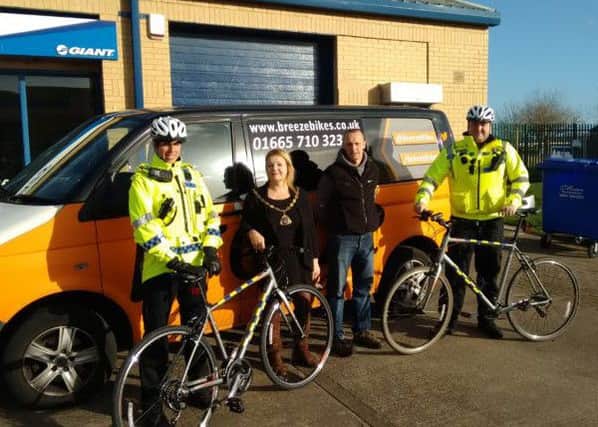 From left: PCSO Julie Wright, Amble Mayor Jane Dague, Mark Breeze and PSCO Kenneth Mouat, with the new bikes. Picture by Martin Horn