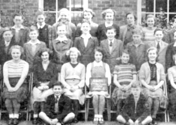 Mr Les Bell from Bartley, county Durham (formerly Seahouses) sent this picture of Alnwick County Modern School back in 1950, he is pictured fourth from right, middle row.