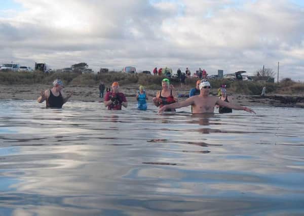 People took part in the Amnesty Swim at Boulmer.