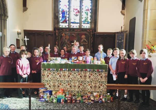 On Tuesday, October 11 our RE Ambassadors, escorted by Mrs Susan Francis and Rev John Beckworth, delivered a large array of food donated by our pupils and parents, the local church community and Belford First school for the Harvest Food Festival Service at St Marys Church in Belford.