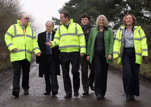 Then Prime Minister David Cameron near the A1 at Causey Park on December 1, 2014.