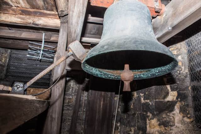 One of the bells inside the clock tower. Picture by Captured Moments Wedding Photography