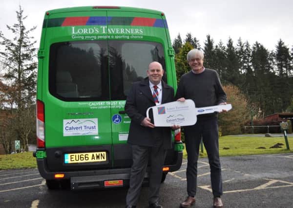 Peter Grieves, from the Lord's Taverners, presented Calvert Trust Kielder CEO, Peter Cockerill, with a new minibus.
