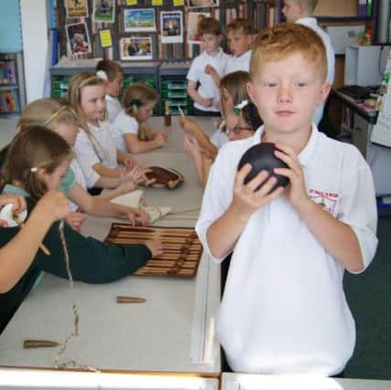 Year 4 pupils from St. Paul's RC Primary School, in Alnwick, get hands-on with the new educational loan boxes.