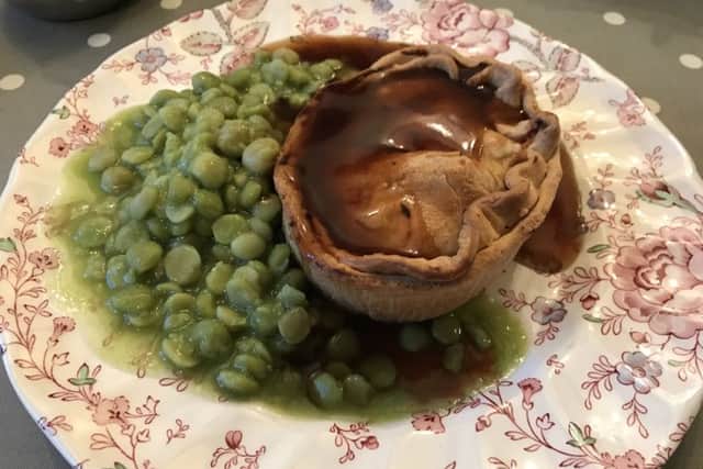 Chicken and ham pie, with mushy peas