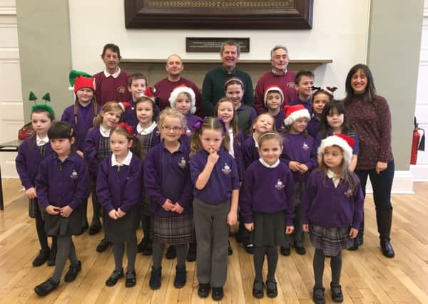 The Swansfield Park Primary School choir performed at the Alnwick Christmas lights coffee morning.