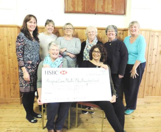 Acklington Art Group: Back row from the left, Rebecca Taylor (Hospice representative), Anne Cairns, Sylvia McClure, Pat Johnson, Christine Boulby, Liz Howe, Front Row, Jessica Cooper, Fattan Parvini, raised a fantastic Â£1,697.57 for HospiceCare.