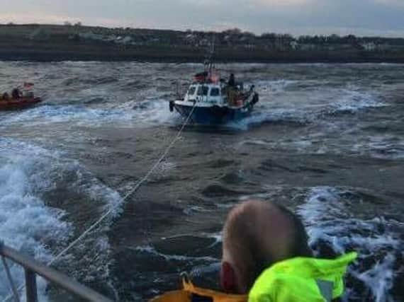 The Bon Amy is towed ashore. Picture by Mark Philips, Amble RNLI crew member.