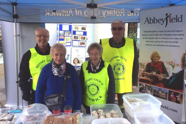Members of the Rotary Club of Alnwick at the Christmas Market.
