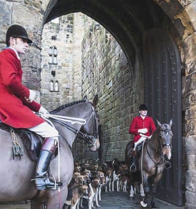 Whipper In Matthew Sewell and  Huntsman Robert McCarthy at the Percy Hunt New Year Meet on Bank Holiday Monday at Alnwick Castle. Picture by Laine Baker