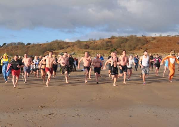 The fourth Alnmouth New Year's Swim.
 Picture by Terry Collinson