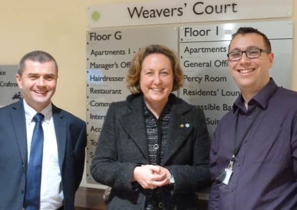 Michael Farr, Isos executive director of development, Anne-Marie Trevelyan MP and David Curran. Weavers Court scheme manager.