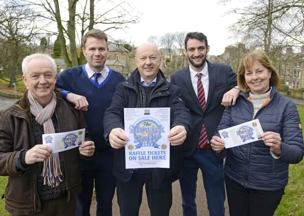 Carlo Biagioni, Chairman of Alnwick Chamber of Trade, promotes the Alnwick Raffle with Norry Davie also from the Chamber, Jonathan Park from the Halifax, Anthony Fyfe from the White Swan and Alison Todd from Jobsons of Alnwick.
 Picture by Jane Coltman