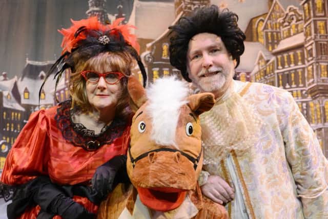 Alnwick Theatre Club stage Cinderella at Alnwick Playhouse
 The evil stepmother with the Baron and the stallion.
Picture by Jane Coltman