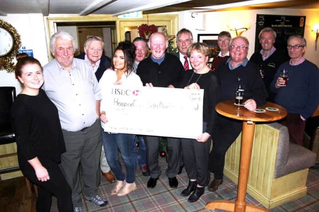 Kind hearted members of The Coach Inn Onion Club, Lesbury, presented HospiceCare, with a cheque for Â£300.