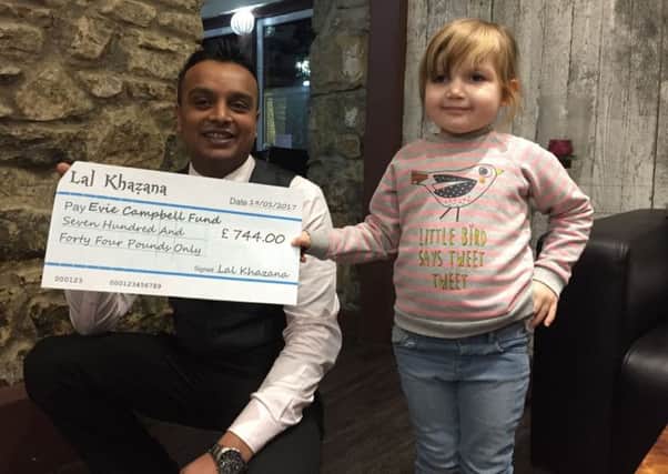 Evie Campbell with Mohammed Hussain, manager of Lal Khazana.