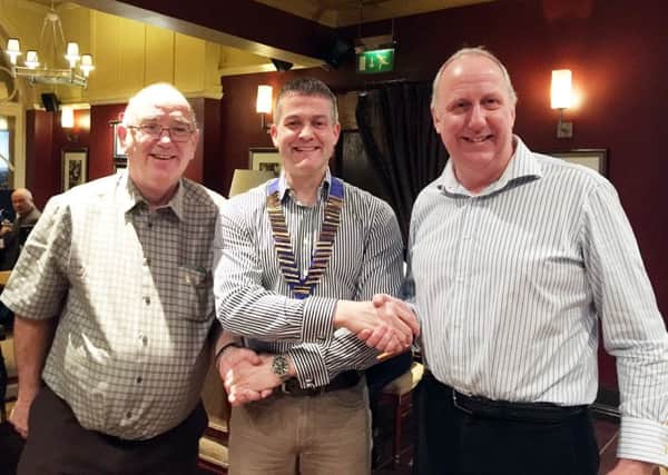 Pictured left to right Lions, Richard Hall, received the Alnwick Rotary Club their highest honour, the Paul Harris Fellowship, John Hughes, Alnwick Lions President, Mark Baker, was awarded the MBE.