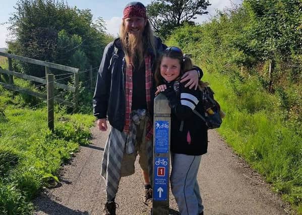 Derek Allan and daughter Ellie during their charity walk.