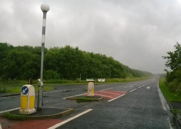 The crossing point on the A1068. Hadston is to the right, while Druridge Bay Country Park is to the left.