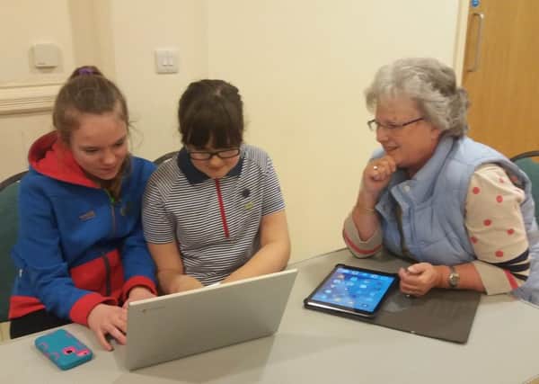 Making use of the broadband at St James's Church Centre in Alnwick.