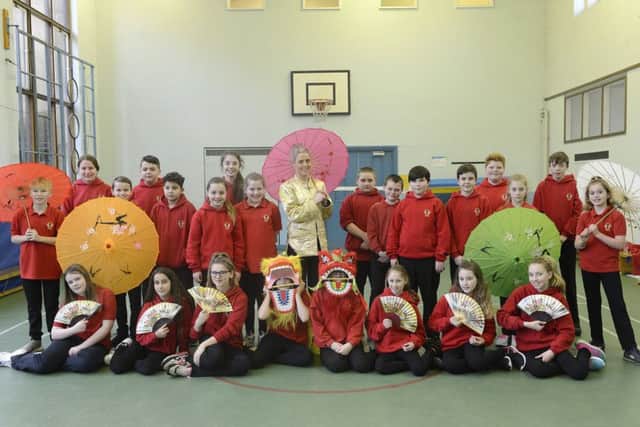 Year 7 pupils who took part in celebrations at the Dukes Middle School in Alnwick to mark Chinese New Year.
 Picture by Jane Coltman
