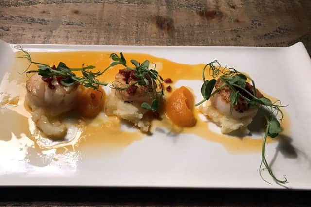 Pan-seared scallops, buttered mash, squash puree, chorizo oil and pea shoots at the Northumberland Arms, Felton.
