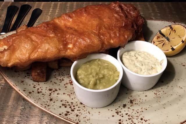 Beer-battered cod and chunky chips, with real mushy peas, homemade tartar and fresh lemon at the Northumberland Arms, Felton.