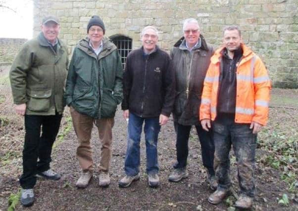 Left to right,  Ivor Crowther, Chris Mullins, Barry Mead, David Lodge, chief executive of Great Morpeth Development Trust, and Clive Waddington at Cresswell Tower.