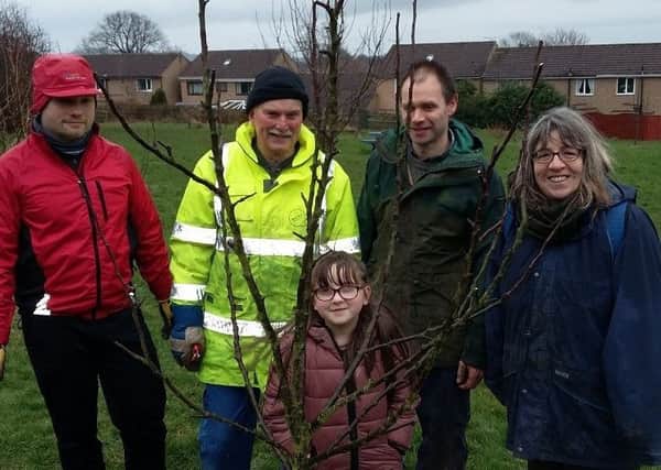 Some of the enthusiastic Bull Field Community Orchard volunteers from Alnwick Area Friends of the Earth.