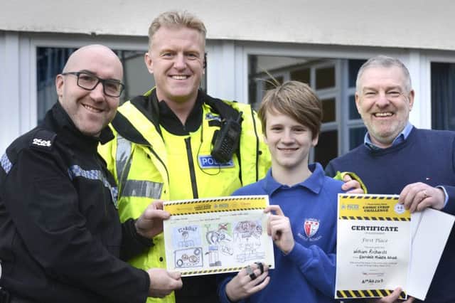 Award winner William Richards with PC Phil Jack and PC Curtis Ritchie both from the Wooler Neighbourhood Police Team and Phil King from Irwin Mitchell who sponsored the event.
 Picture by Jane Coltman