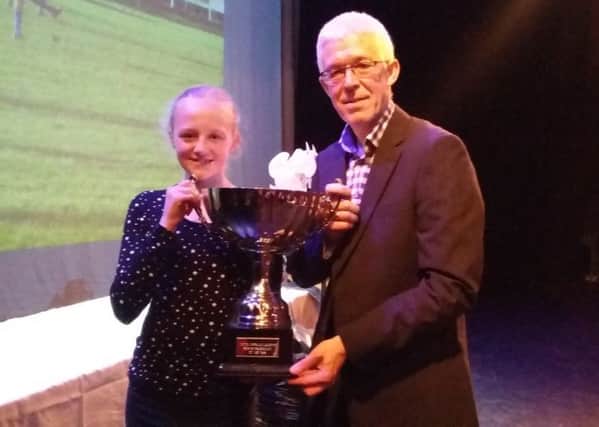 Amy Stokoe was the winner of the Northumberland Gazette Sports Personality of the Year award for 2016. She is pictured with Gazette editor Paul Larkin.