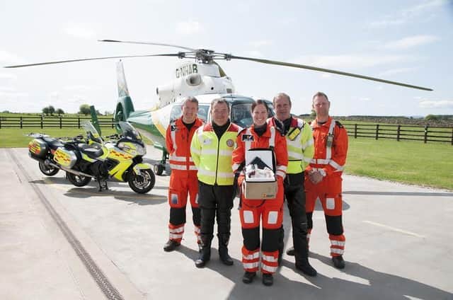 GNAAS pilot Phil Lambert, John Quinn of Blood Bikes Cumbria, Dr Rachel Hawes, Steve Rawlings of Northumbria Blood Bikes and GNAAS paramedic Andy Dalton.
