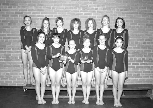Image of yesteryear, Druridge Bay Middle School Gymnastics team, with their awards, do you know what the occasion was or who the people were?