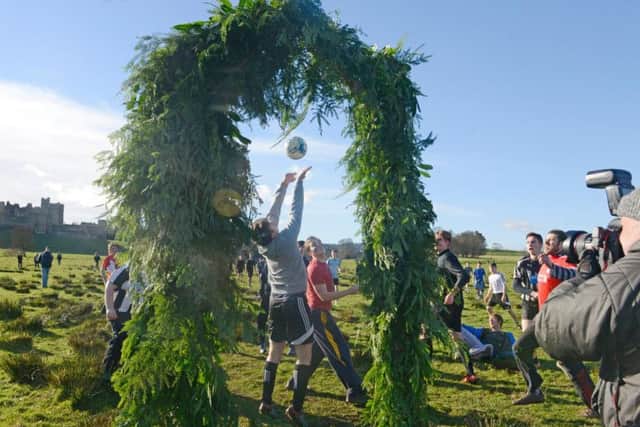Action from the Alnwick Shrovetide football match. Pictures by Jane Coltman