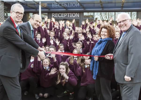 Andy Johnson, head of education, executive head John Barnes, Coun Susan Dungworth, Chair of Governors, and Ronnie Campbell MP at the official opening of the relocated Whytrig Community Middle School in 2014.