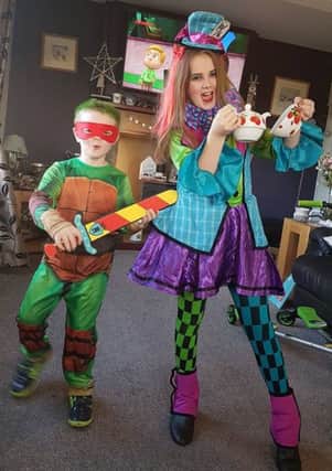 Teagan and Charlie Davidson dressed as the Mad Hatter and a Ninja Turtle for World Book Day.