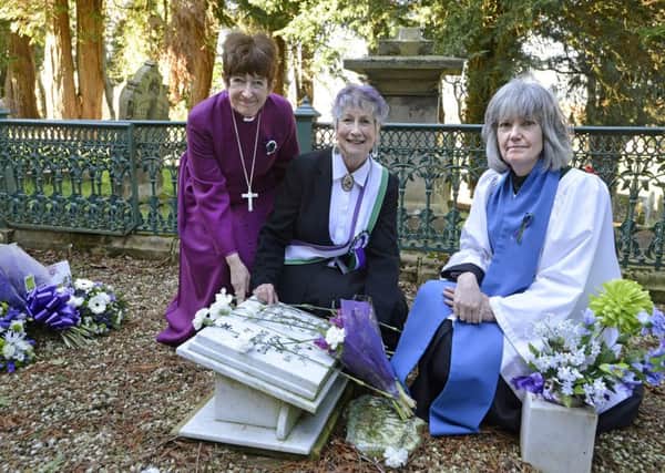 The Right Reverend Christine Hardman, Bishop of Newcastle, event organiser Penni Blythe and Reader Vivienne Sommerville during the service at St Mary's Church in Morpeth organised by Emily Inspires! and Northumberland County Council - tributes were laid at the grave of Suffragette Emily Wilding Davison on International Women's Day.  Picture by Jane Coltman.