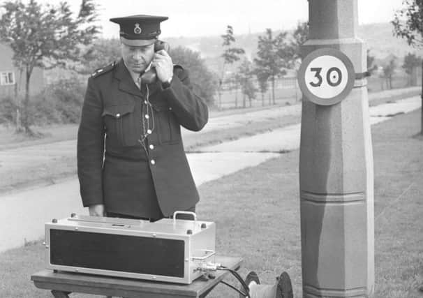 Police Radar in Sunderland September 1962 old ref number 31-3586  nostalgia news   picture caption:  Drivers in Sunderland will be traced by radar from next Monday.  And those found on the set to be exceeding the speed limit will be stopped.  This warning was given today by the Chief Constable Mr W Tait.  
Sunderland Police now have a radar set - or portable electronic traffic analyster to give its full title - with a white needle that registers the speed of traffic coming towards and moving away from the set.

nostalgia news  retro