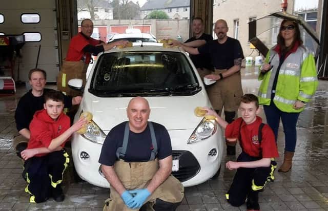 The charity car wash at Alnwick, held in memory of firefighter Tom Naples.