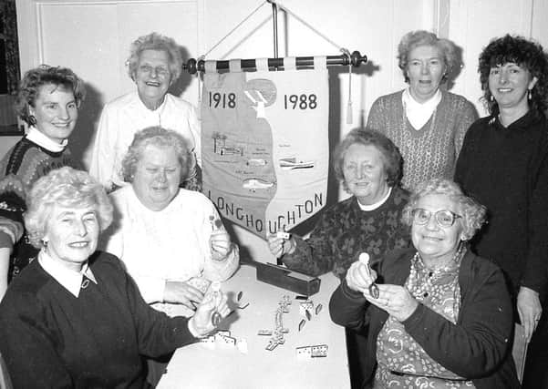 Remember when from 25 years ago, Boulmer WI domino champions around the banner