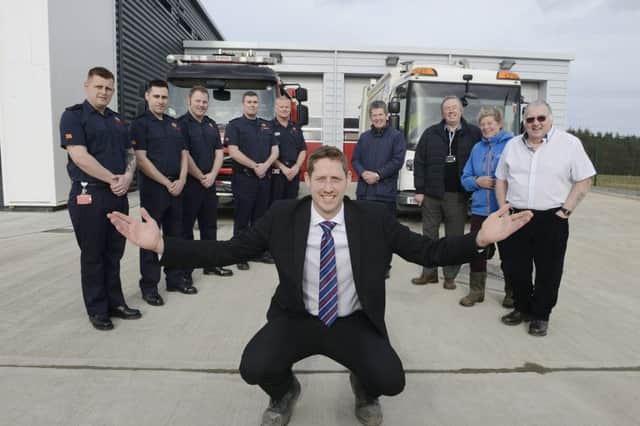 Project manager Michael Connelly with fire officers Glyn Cooper, Nick Douglas, John Winter, Pat Caffrey and Mark McCarty and county councillors Gordon Castle, Ian Swithenbank, Heather Cairns and Dave Ledger at the new community fire station and expanded council depot in Alnwick.
 Picture by Jane Coltman