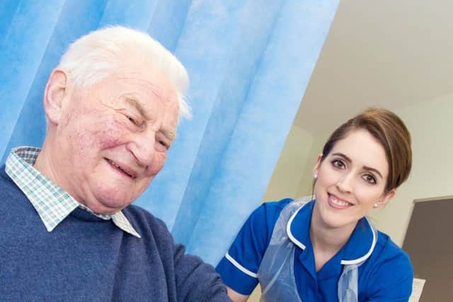 82-year-old patient Tom Snaith with community nurse  Lauren Cockburn.