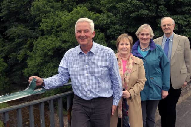 Glen Sanderson, Eleanor George, Anne Morton and Jim Routledge at the bridge in Felton in 2012.
