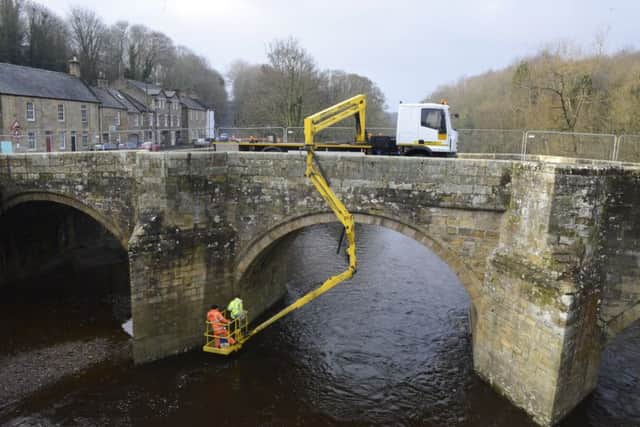Work being carried out on the old bridge in Felton earlier this year.