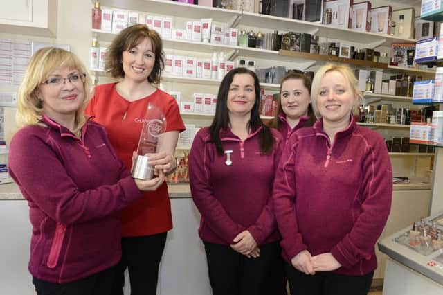 Guinot Business Development Manager Angela Miller presents the Crown Salon award to the Beauty Box's Jane Atkin ( left), Joanne Barlow, Janine Shaw and Lucy Mallaburn.
 Picture by Jane Coltman