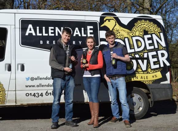 Tom and Lucy Hick and head brewer Neil Thomas with the three Allendale Brewery beers that are being stocked in Tesco.