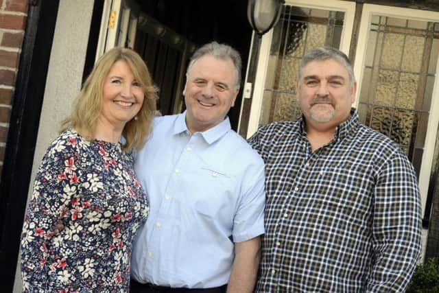 Colin Flannery and his wife Gail and neighbour Derek Scott.
 Picture by Jane Coltman